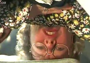 Curly-haired grandma wants some standing sex