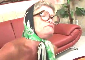 Granny with big bobos fucked on the sofa