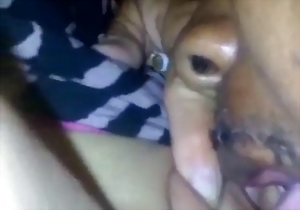 A sweet black lover is licking her accurate white pussy